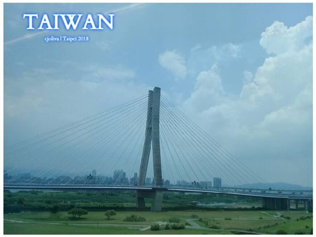 Cable-stayed bridge and Taipei skyline, seen from the Airport MRT on our way into the city