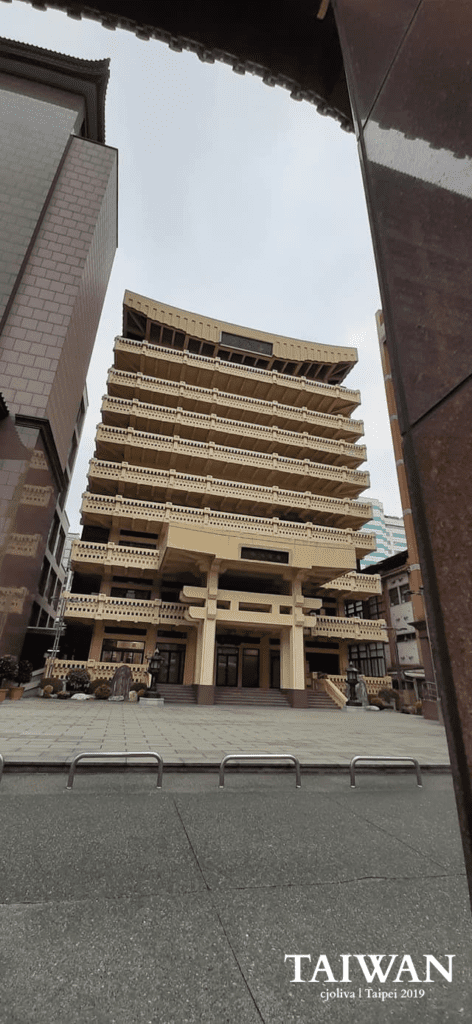 Shandao Temple multi-story building with ornate railings and columns in Taipei, Taiwan.
