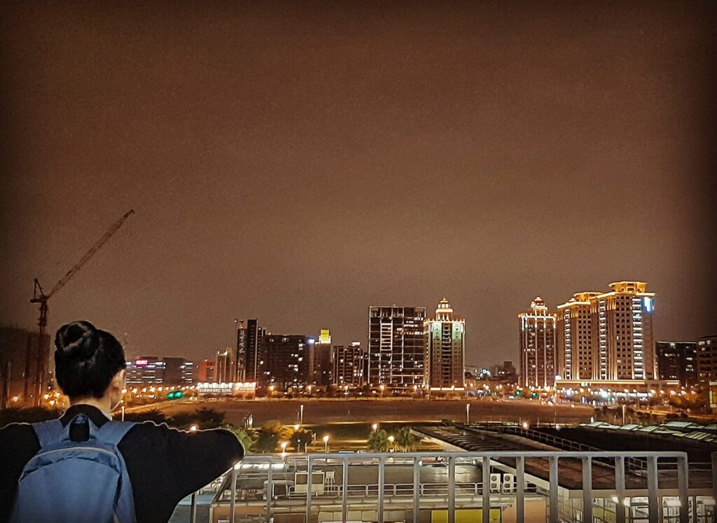 Night view of illuminated skyline from Taoyuan HSR Station in Taiwan.