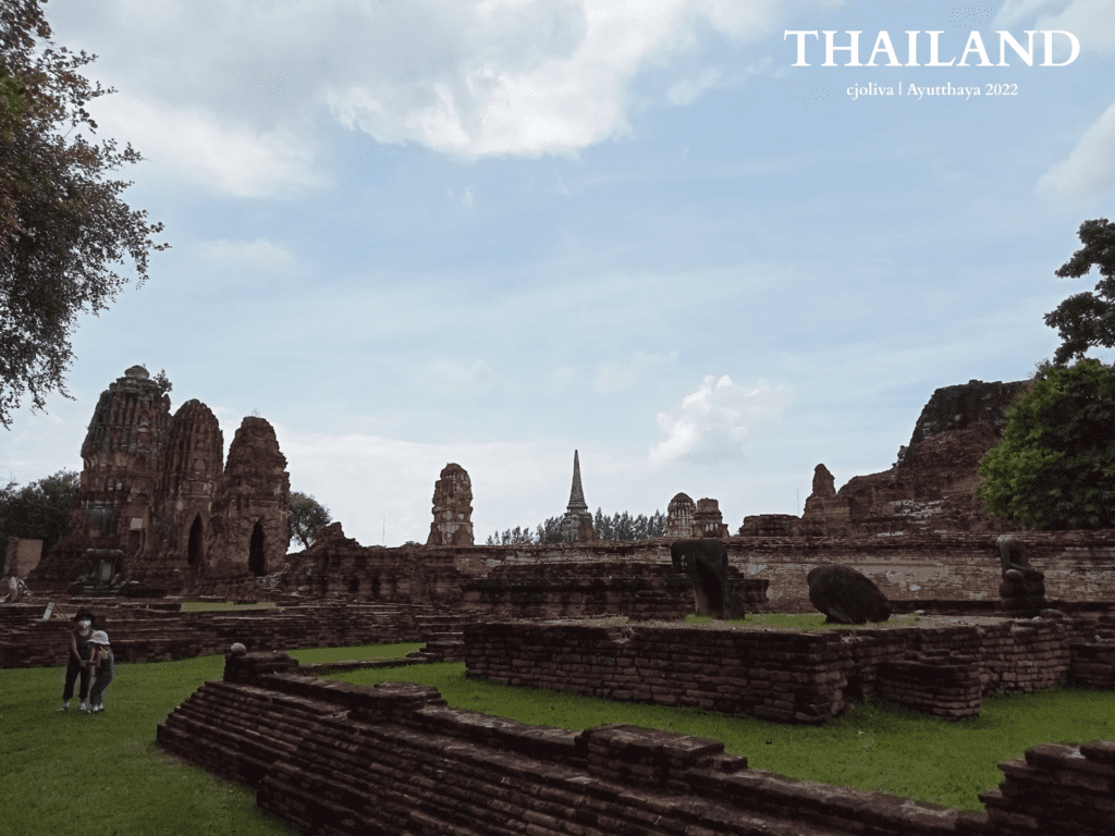 Brick temple ruins with prangs and chedis at Ayutthaya Historical Park, Thailand
