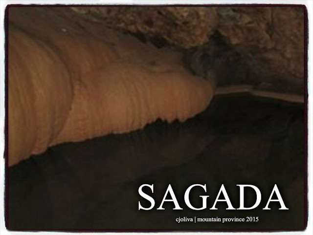Close-up view of a cave formation with stalactites and dark water inside a cave in Sagada, Mountain Province, 2015.