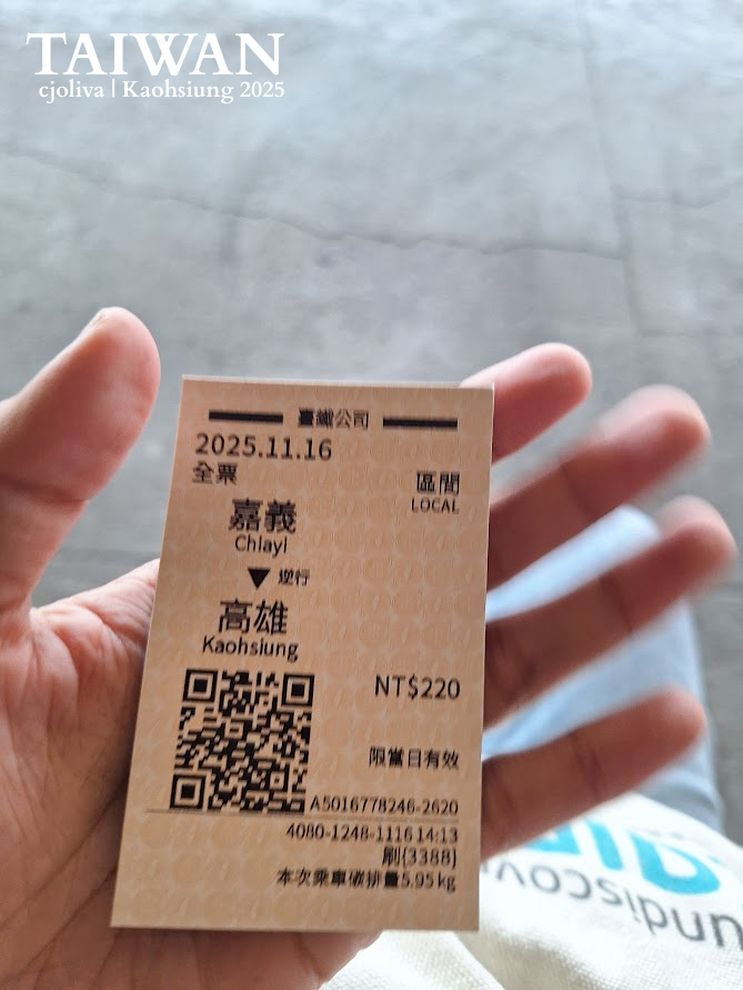 Close-up of a Taiwan Railways local train ticket from Chiayi to Kaohsiung, held in a traveler's hand, dated 2025.11.16.