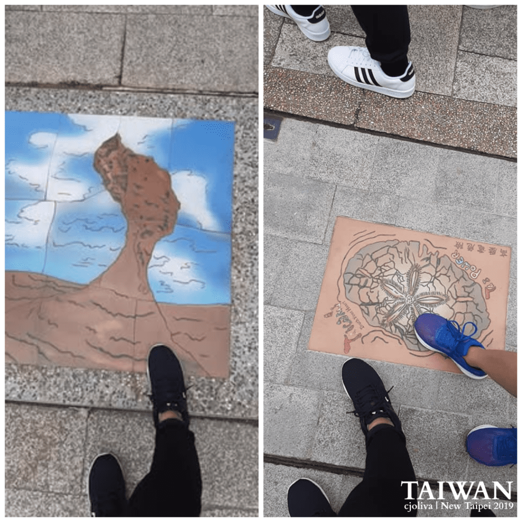 Collage of sidewalk tiles in New Taipei, Taiwan, showing painted Queen’s Head rock formation and a peace emblem with multilingual text, taken in 2019