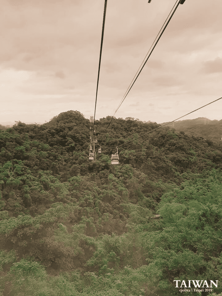 Maokong Gondola cable cars over lush forest in Taipei during 2019 trip
