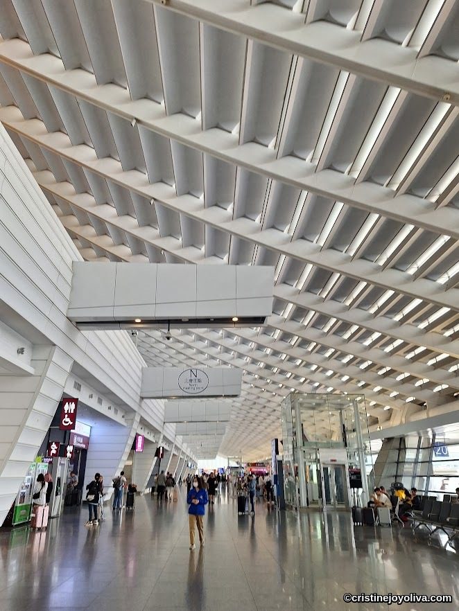 Interior of Taiwan Taoyuan International Airport terminal with modern design and N Center Gate signage