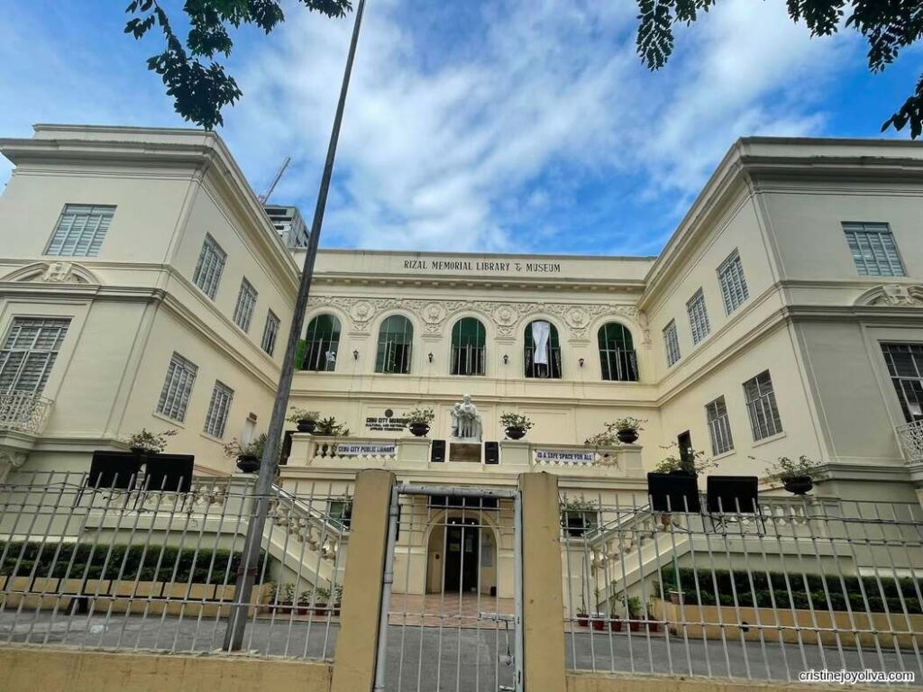 Exterior view of Rizal Memorial Library and Museum building with clear blue sky