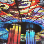 The colorful stained-glass Dome of Light ceiling at Kaohsiung Metro station is a vibrant landmark often featured in Kaohsiung Solo Travel experiences.