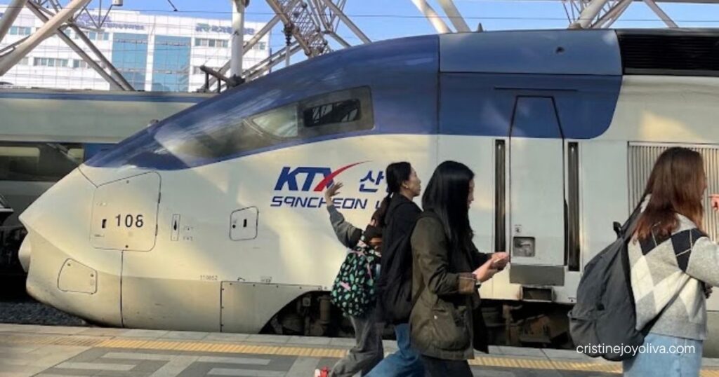 KTX-Sancheon train on the platform at Seoul Station after arriving from Busan, with passengers walking past