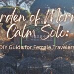 A title graphic over the Garden of Morning Calm entrance sign surrounded by pine trees and sphere light installations
