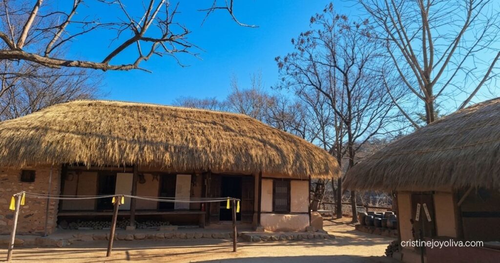Thatched-roof farmer's house at Korean Folk Village Yongin, a common K-drama filming backdrop.