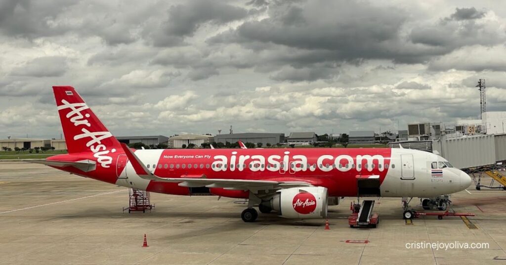 AirAsia plane at the gate on arrival at Don Mueang Airport, where my transfer to Ratchathewi began