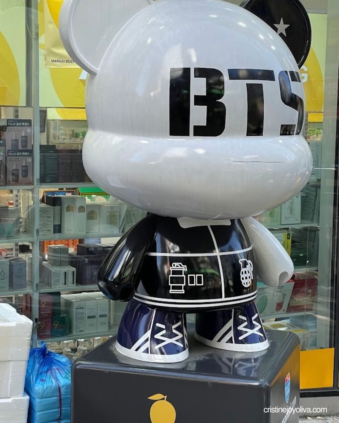 Large white and black BTS bear statue outside a shop in Myeongdong, Seoul